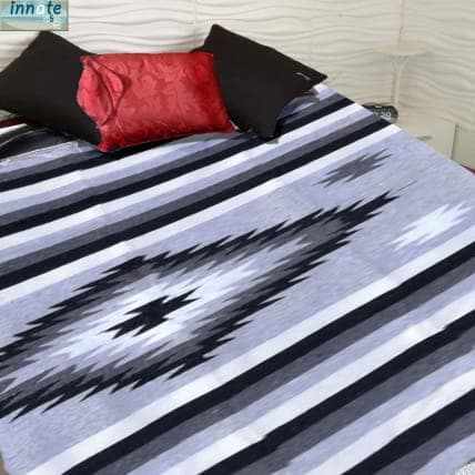 Redish tones Navajo/ Aztec saddle blanket design. Thickly handmade and woven with recycled fibers from cotton and acrylic. Please refer to photo and video for colors. This is a brand new, loom made with recycled fibers blanket.