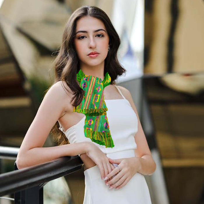 Woman wearing a colorful top and white skirt with blurred background